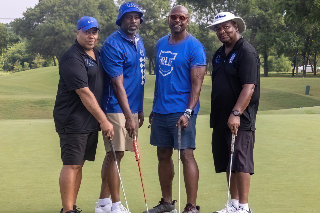 Four Phi Beta Sigma Fraternity members participating in a golf event, representing brotherhood, fellowship, leadership, and community engagement.
